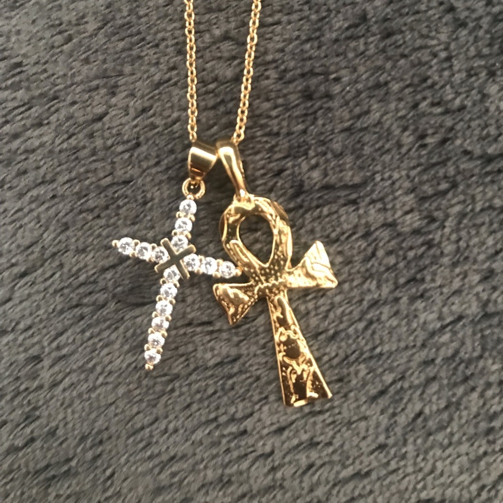 Gold cross and Egyptian ankh necklace.